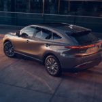 A grey 2022 Toyota Venza is shown from the rear at an angle at dusk.