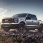 A silver 2023 Ford F-150 Rattler is shown from the front at an angle.