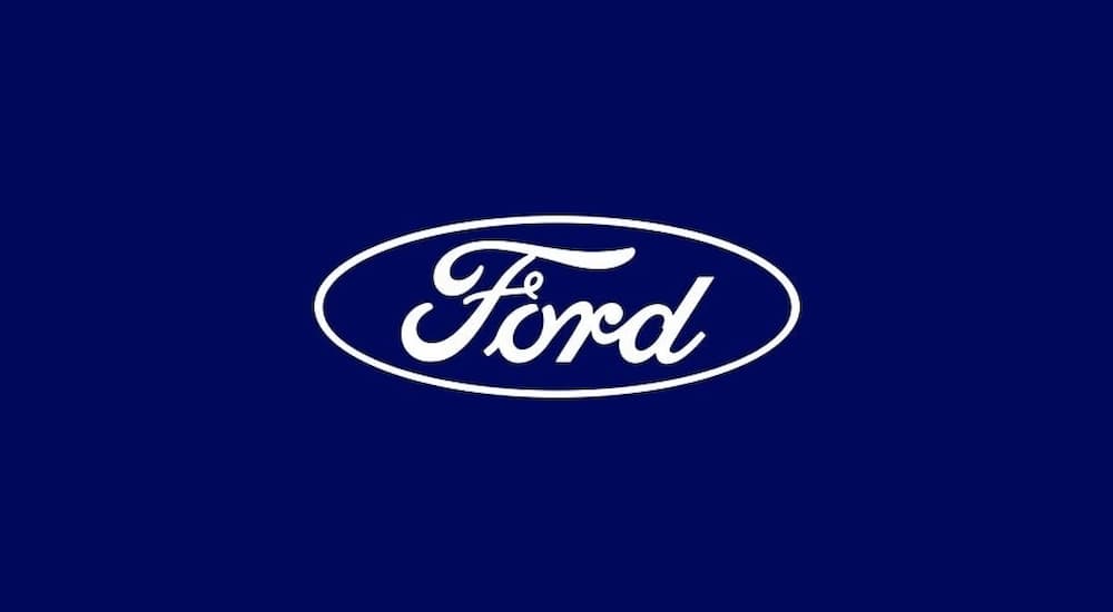 White Ford logo on blue background.