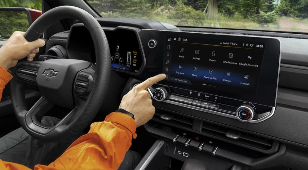 A close-up of the infotainment screen is shown in a 2024 Chevy Colorado.