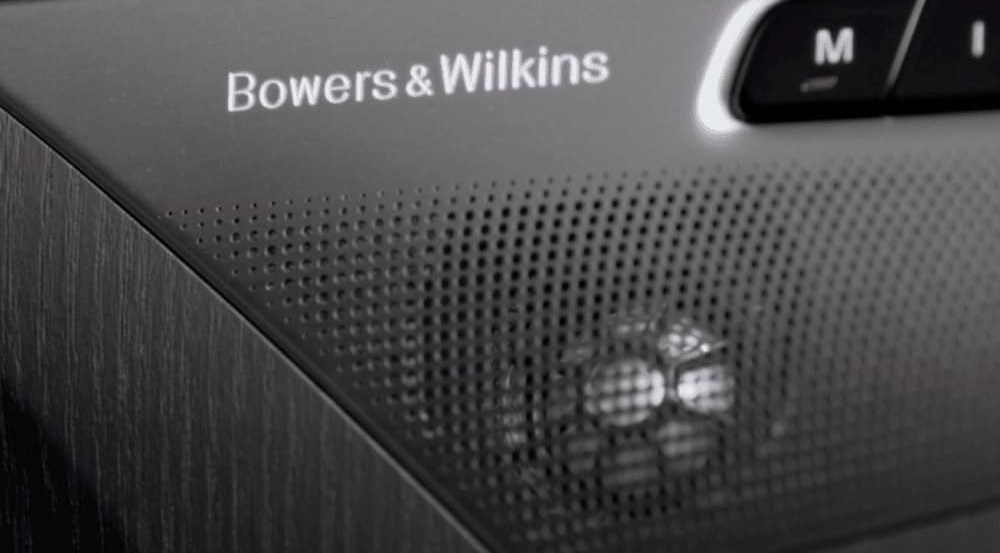 Bowers & Wilkins speakers are shown in a vehicle.