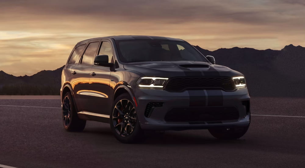 A black 2024 Dodge Durango for sale parked and angled right.