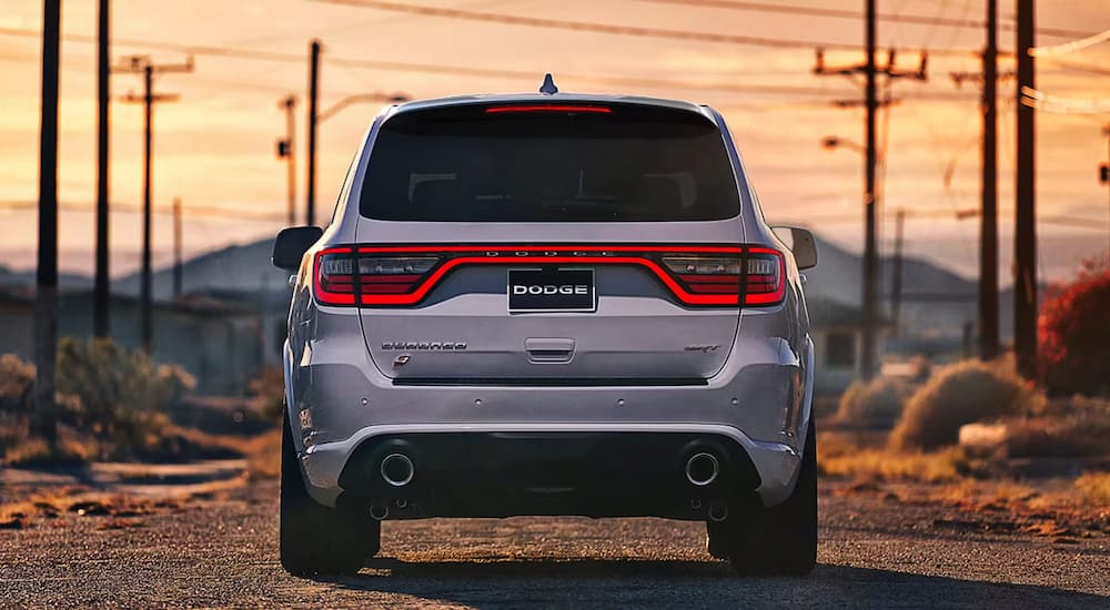 A rear view of a white 2024 Dodge Durango SRT.