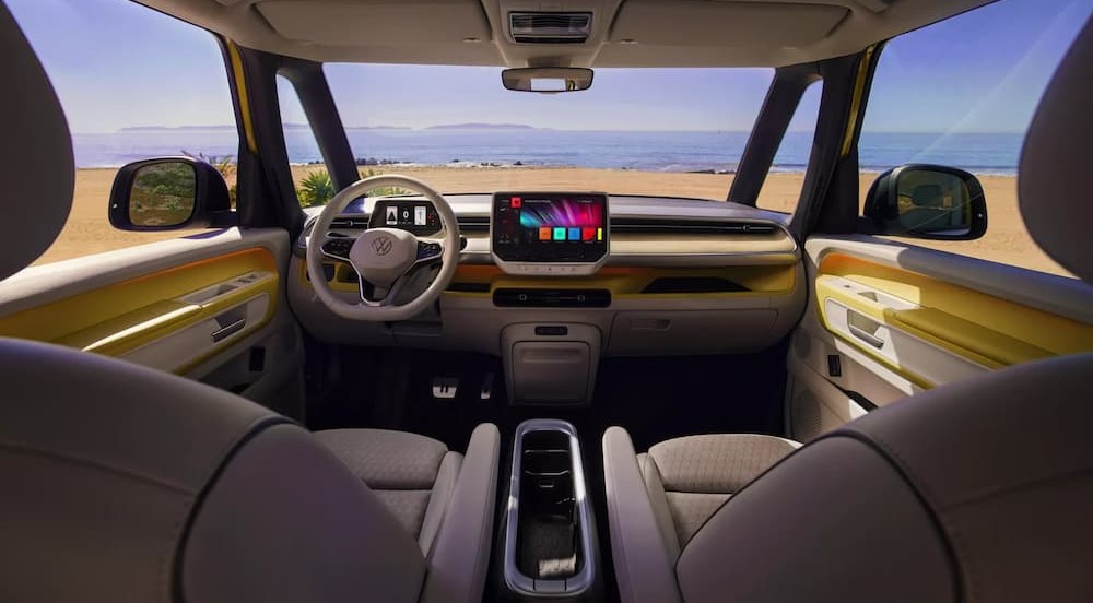 The gray and yellow interior and dash in a 2025 Volkswagen ID.Buzz is shown.