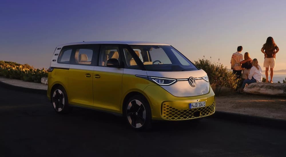 A yellow 2025 Volkswagen ID.Buzz is shown parked near a family.