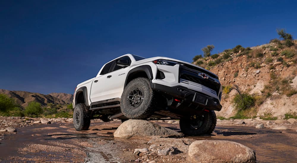 A white 2024 Chevy Colorado ZR2 Bison is shown from the front at an angle.