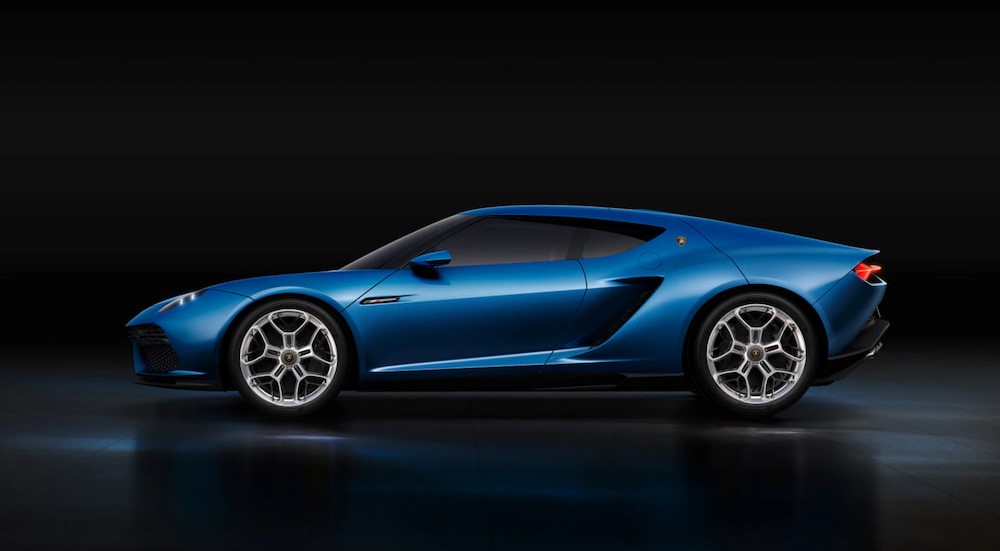 A blue Lamborghini Asterion concept car is shown parked on a showroom floor.