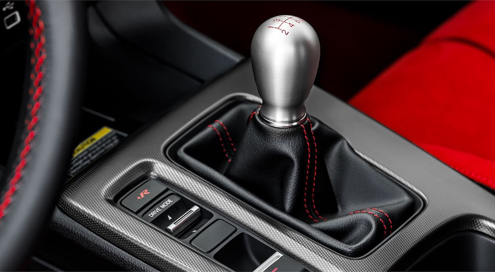 The manual shifter is shown in a 2024 Honda Civic Type R.