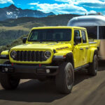 A green 2024 Jeep Gladiator Mojave is shown from the front at an angle.