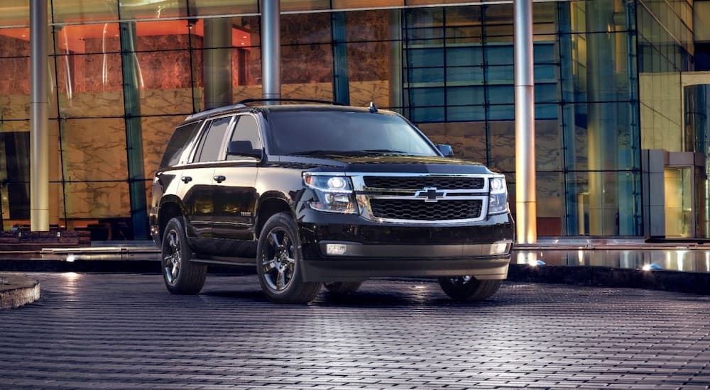 A black 2017 Chevy Tahoe is shown from the front at an angle.