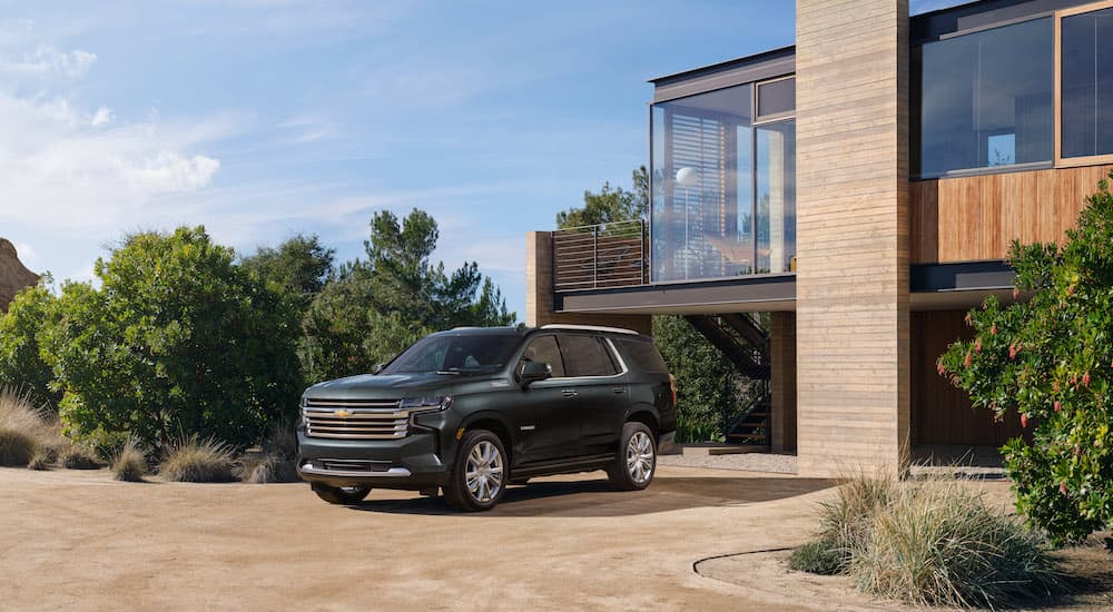 A grey 2022 Chevy Tahoe is shown from the front at an angle.