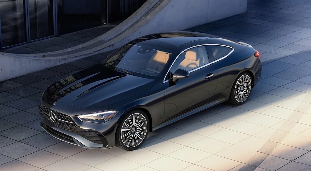 A black 2024 Mercedes-Benz CLE Coupe is shown from the front at an angle.