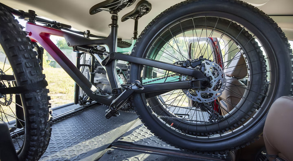 Two bikes mounted on the interior bike racks in a 2024 Ford Bronco Sport for sale.