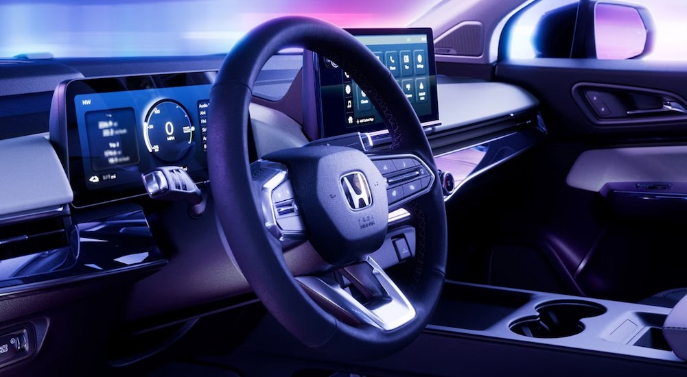 The black and gray interior and dash in a 2024 Honda Prologue is shown.