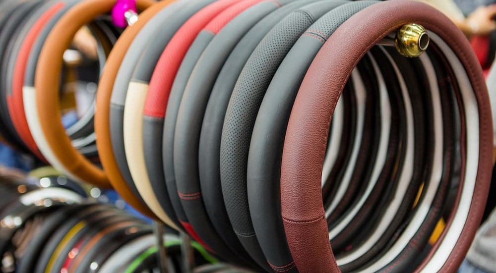 A rack of steering wheel covers is shown.