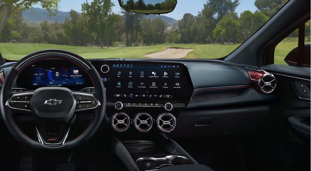 The black interior and dash are shown in a 2025 Chevy Blazer EV RS.