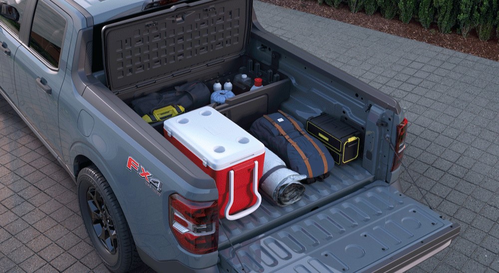 A close-up of the bed of a gray 2025 Ford Maverick FX4 is shown.