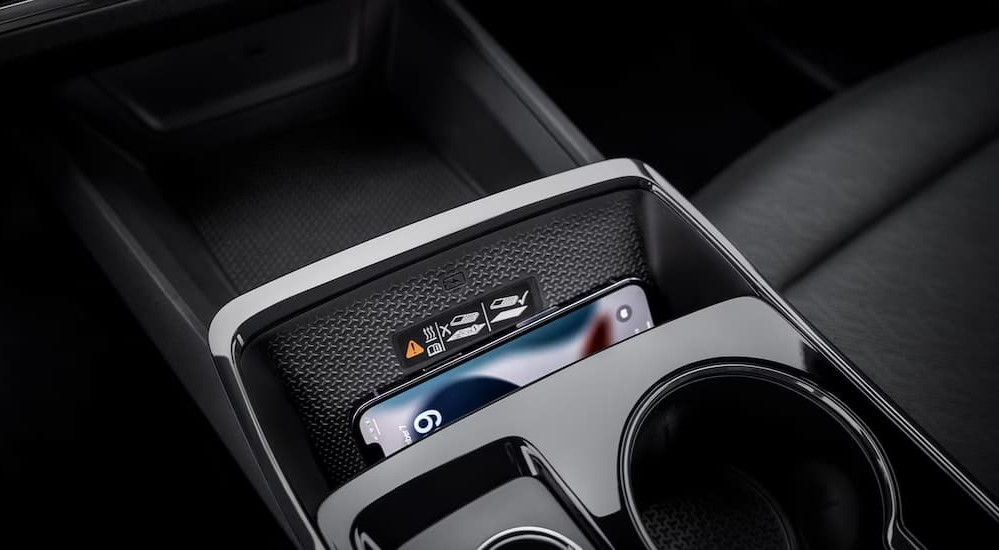 A close-up of the center console is shown in a 2025 Chevy Equinox.