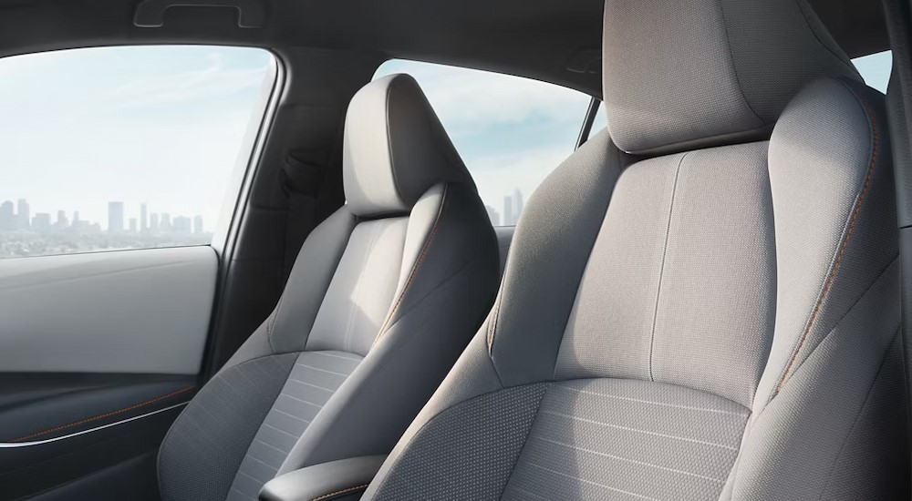 The gray interior is shown in a 2025 Toyota Corolla FX.