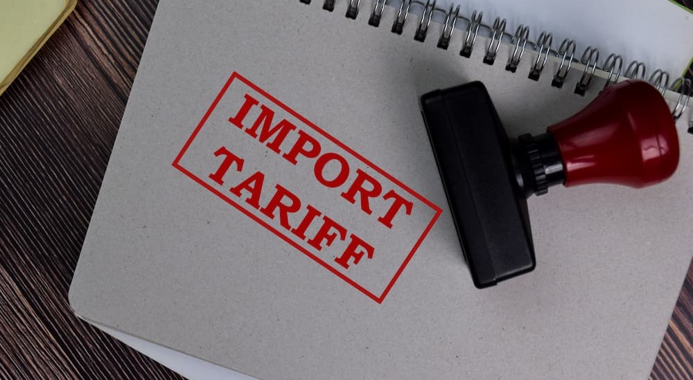 "Import tariff" is shown stamped on a notepad.