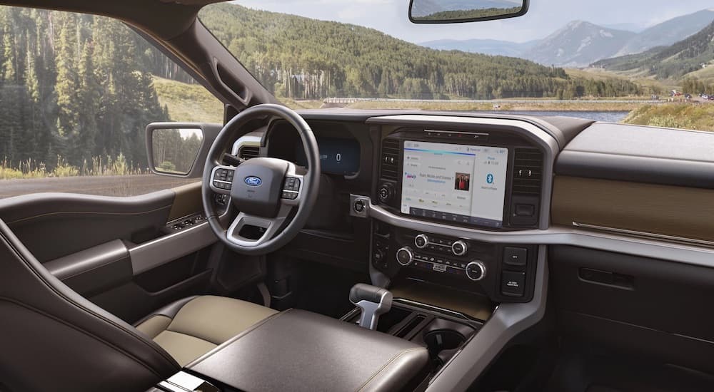 The tan and brown interior of a 2024 Ford F-150 XLT.