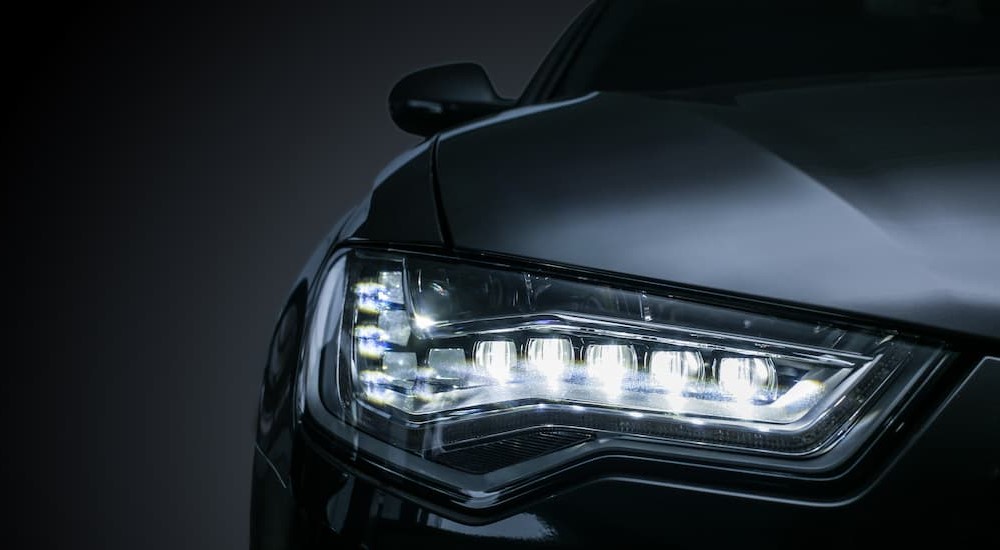 LED headlights are shown on a vehicle.