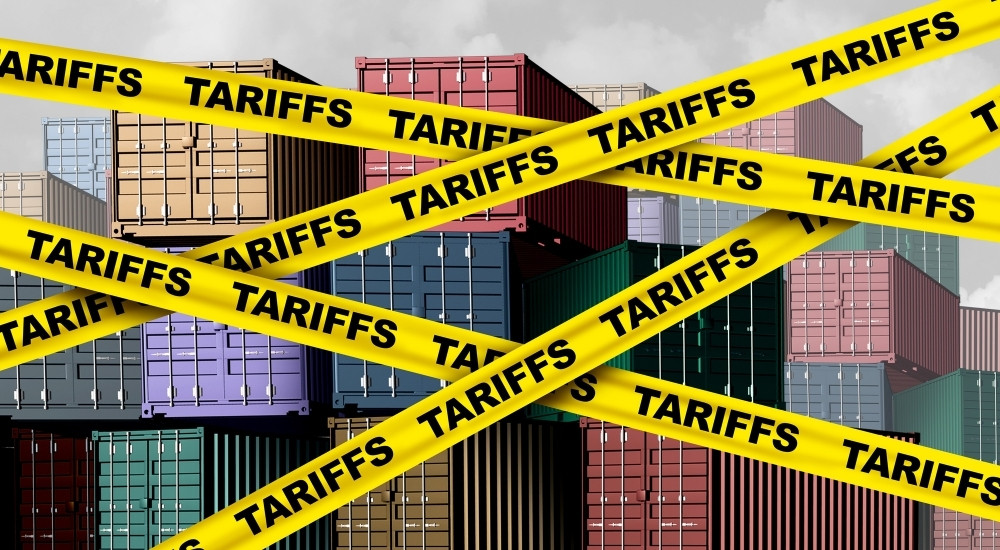 Yellow tariff tape is shown in front of shipping containers.